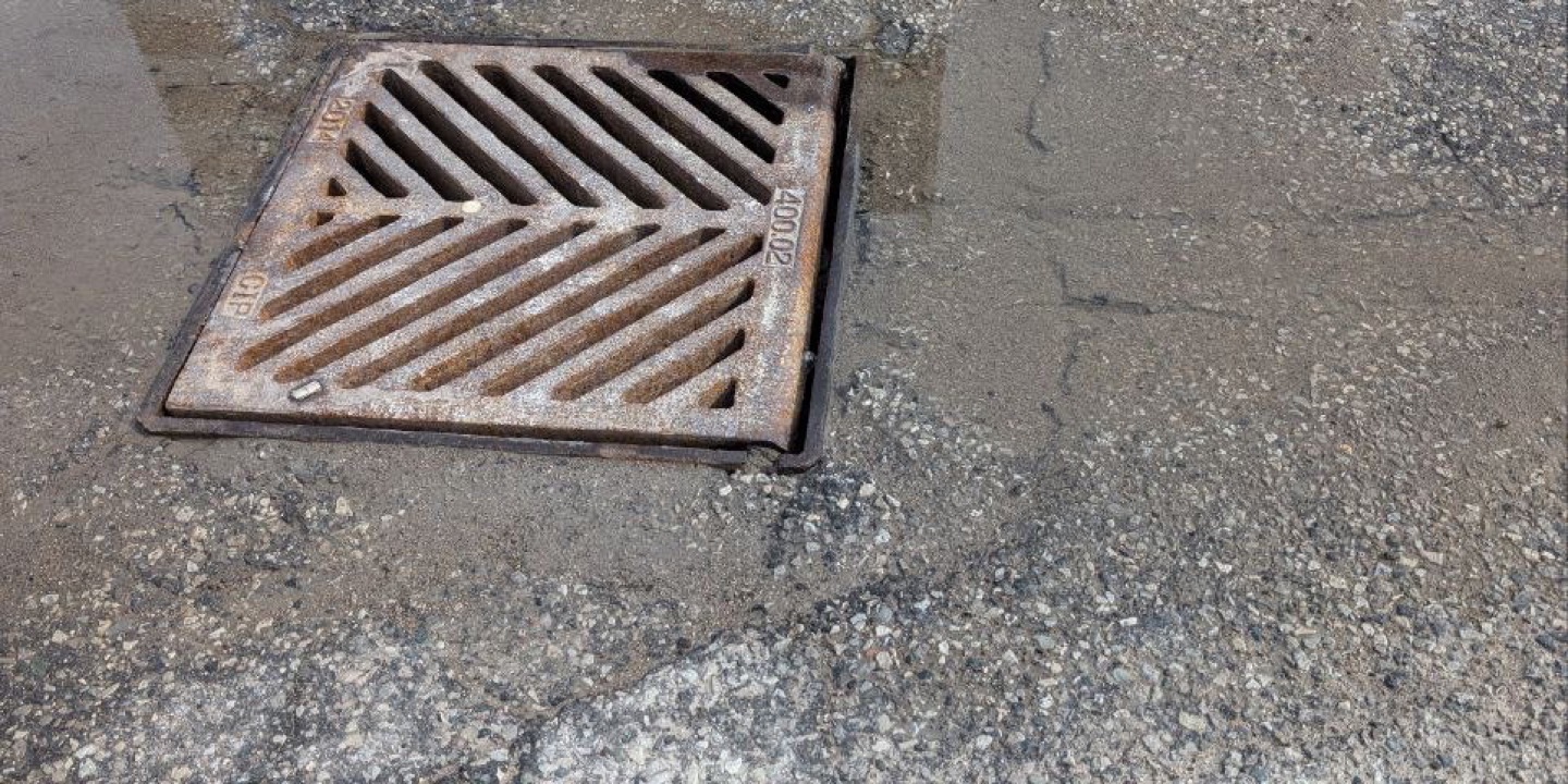 Catch basin grate, GTA commercial parking lot